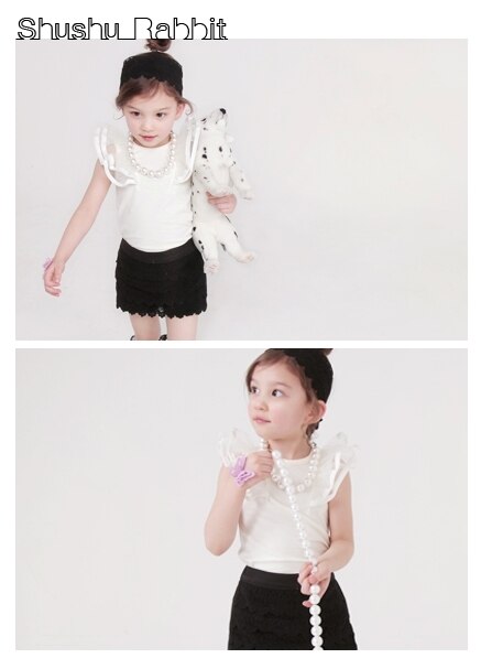 Deluxe Rodini Ivory Blouse ( Made in Korea)